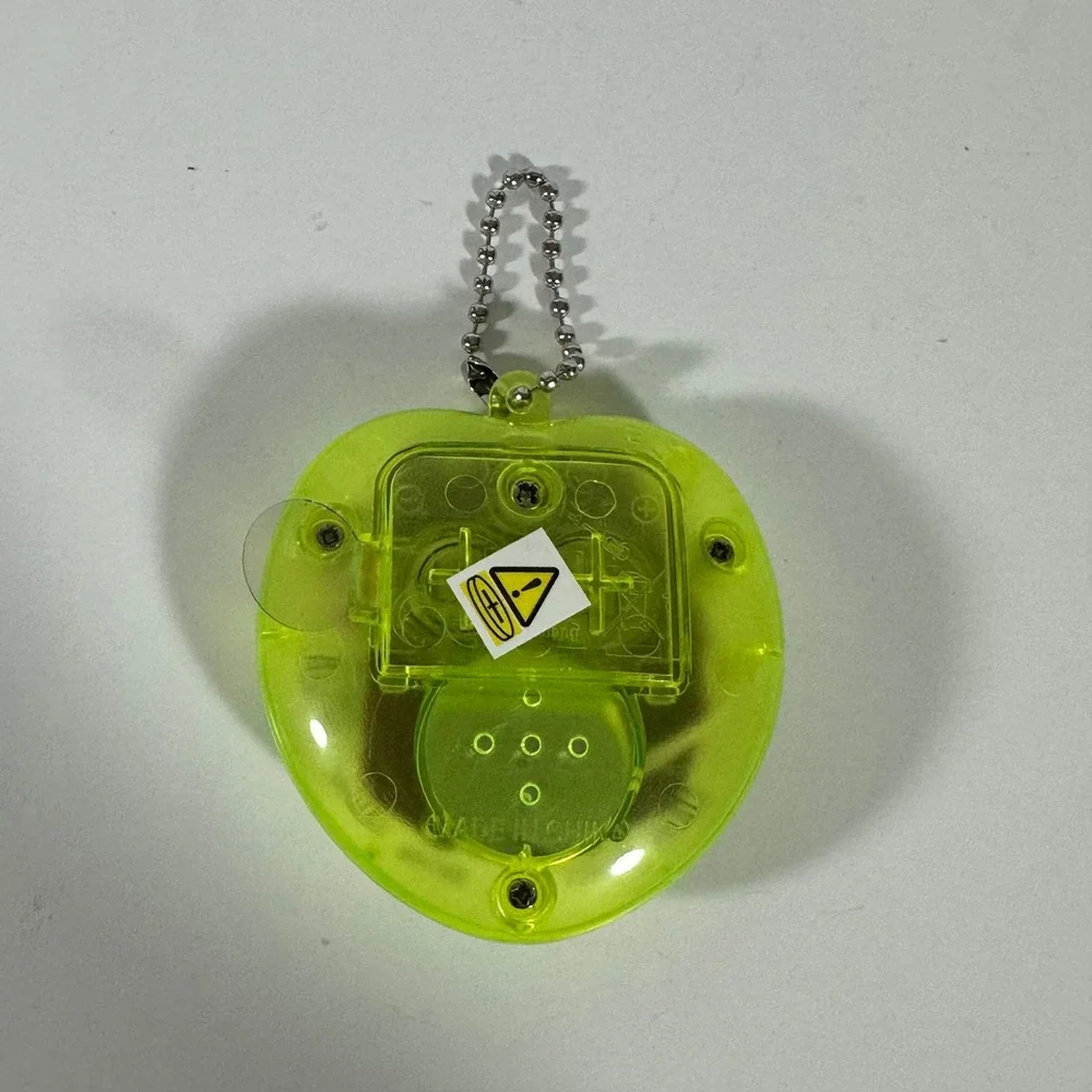 Han Cheng Virtual Pet Handheld Game Neon Lime Green Heart Translucent Retro Toy
